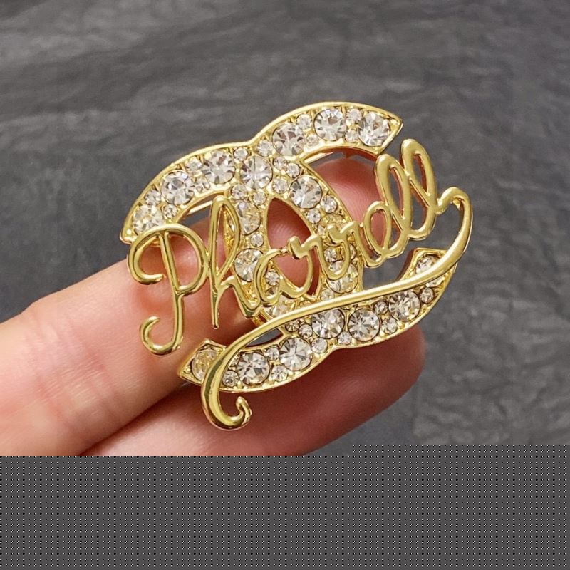 Ch*el brooches